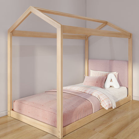 Wooden house-frame kids/toddler bed with pink mattress, plaid duvet, upholstered headboard and plush letter A pillow in a modern girls' bedroom