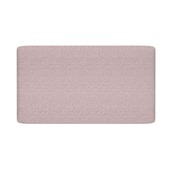 Blush pink rectangular upholstered headboard with textured fabric finish for modern minimalist bedroom decor