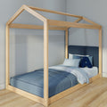 Natural wood house-frame kids bed with blue bedding and decorative pillows on hardwood floor, modern children's canopy toddler bed for nursery.