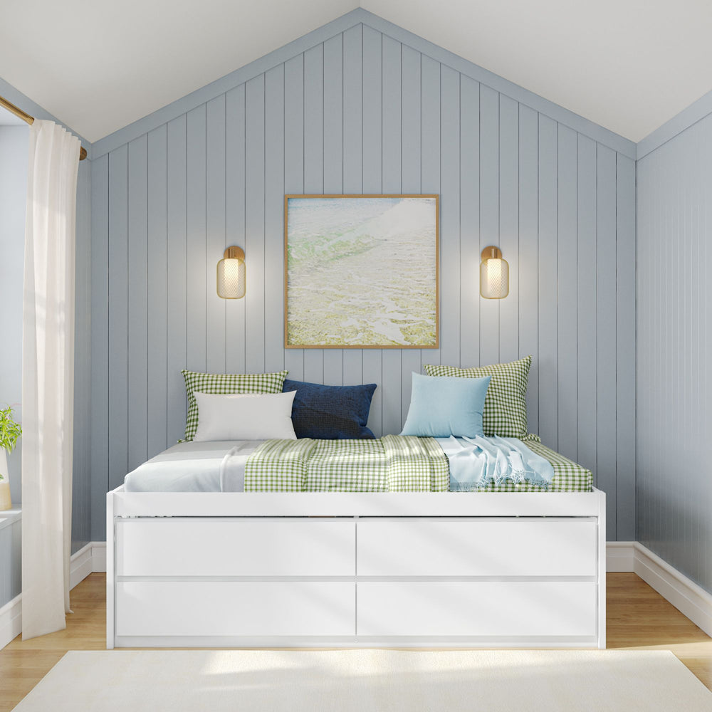 Cozy modern bedroom with white bed, blue wood panel walls, and stylish wall lighting.