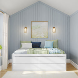 Cozy modern bedroom with white bed, blue wood panel walls, and stylish wall lighting.