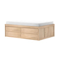 Light wood platform storage bed with white mattress topper, built-in drawers and side cabinet, modern space-saving bedroom furniture