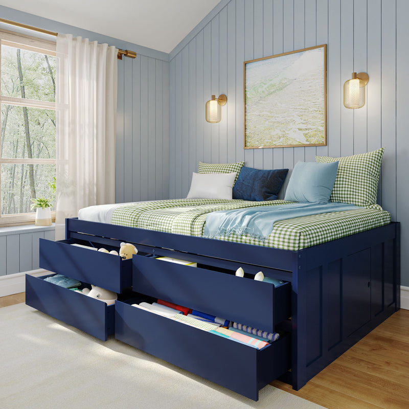 Blue storage bed with open drawers in modern bedroom.