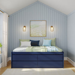 Blue and green cozy bedroom with modern wall lights and wooden paneling.