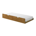 Single oak-effect wooden pull-out trundle bed with white mattress on low-profile underbed storage platform, modern minimalist design
