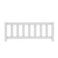 White wooden slatted fence panel with vertical pickets and square end posts, modern outdoor garden railing isolated on white background