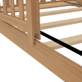 Close-up of solid oak platform bed frame with wooden slatted base and black metal center support rail, natural oak finish