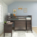 Dark wood kids loft bed with built-in desk and dresser in coastal blue nursery, framed surf van, sun-and-waves and shaka wall art