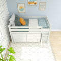 White loft bed with built-in storage drawers and ladder in a modern coastal kids' bedroom with blue accents, patterned rug and potted plant
