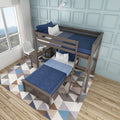 L-shaped wooden twin loft bunk bed with ladder, blue bedding and pillows, built-in desk, geometric rug in a light-blue paneled kids' bedroom by a window