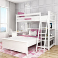 White wooden twin-over-full bunk bed with ladder, built-in desk and open shelves, pink bedding and geometric rug in a bright modern kids' bedroom
