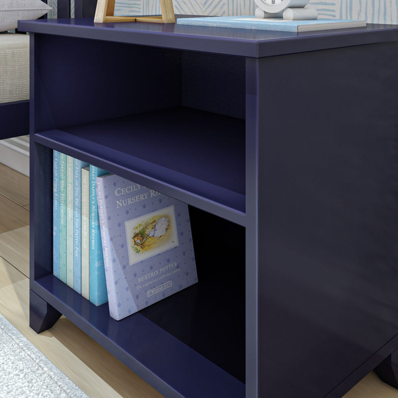 Dark blue bookshelf with children's nursery rhyme books on wood floor.