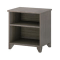 Grey wooden nightstand with two open shelves for bedroom storage.