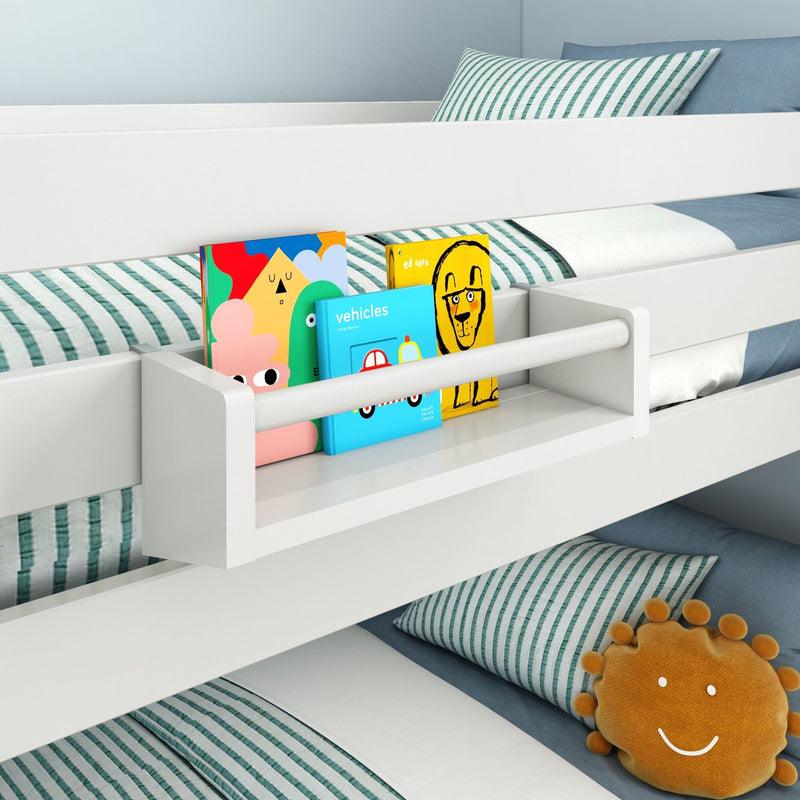 White bunk bed with built-in bookshelf holding colorful children's books and striped bedding.