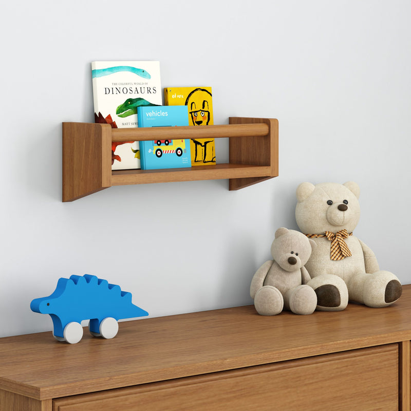 Children's room decor featuring a wooden shelf with colorful books, soft teddy bears, and a playful blue dinosaur toy.