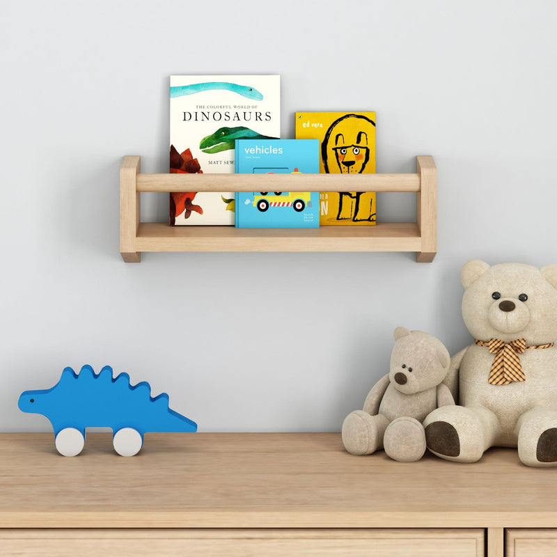 Wooden bookshelf with children's books and plush teddy bears on a nursery shelf.