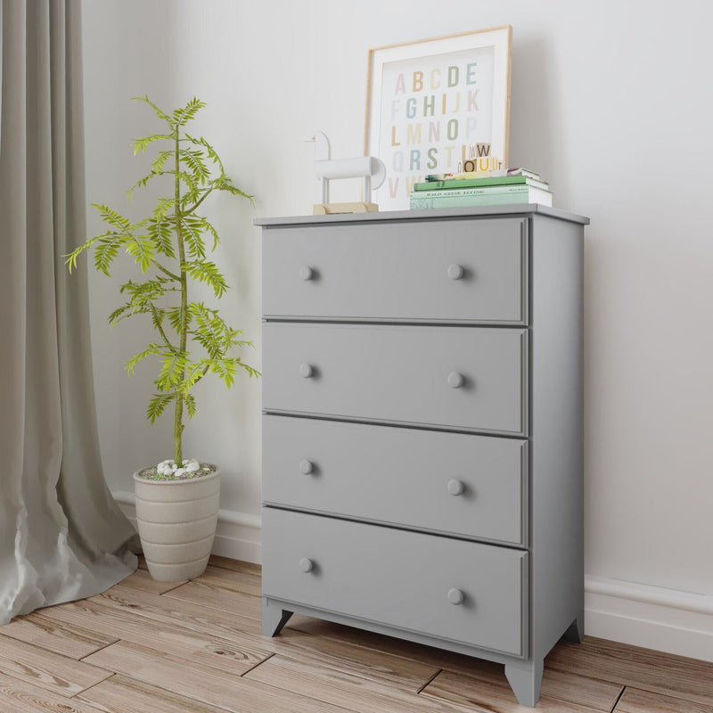 Gray wooden dresser with plants and framed alphabet art in a modern minimalist bedroom.