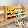 Light wood kids bunk bed with built-in bedside bookshelf holding colorful children's books and patterned pillows, space-saving kids bedroom storage solution