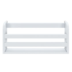 White wall-mounted book rack with three horizontal slats for nursery or kids room storage.