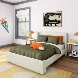 Modern kids bedroom with cozy bed, plush fox toy, and colorful decor.