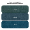 Three textured teal carpet color swatches labeled "Warm," "Neutral," and "Cool" beneath the heading "Color can vary with different lighting conditions," illustrating how carpet color shifts under different lighting.
