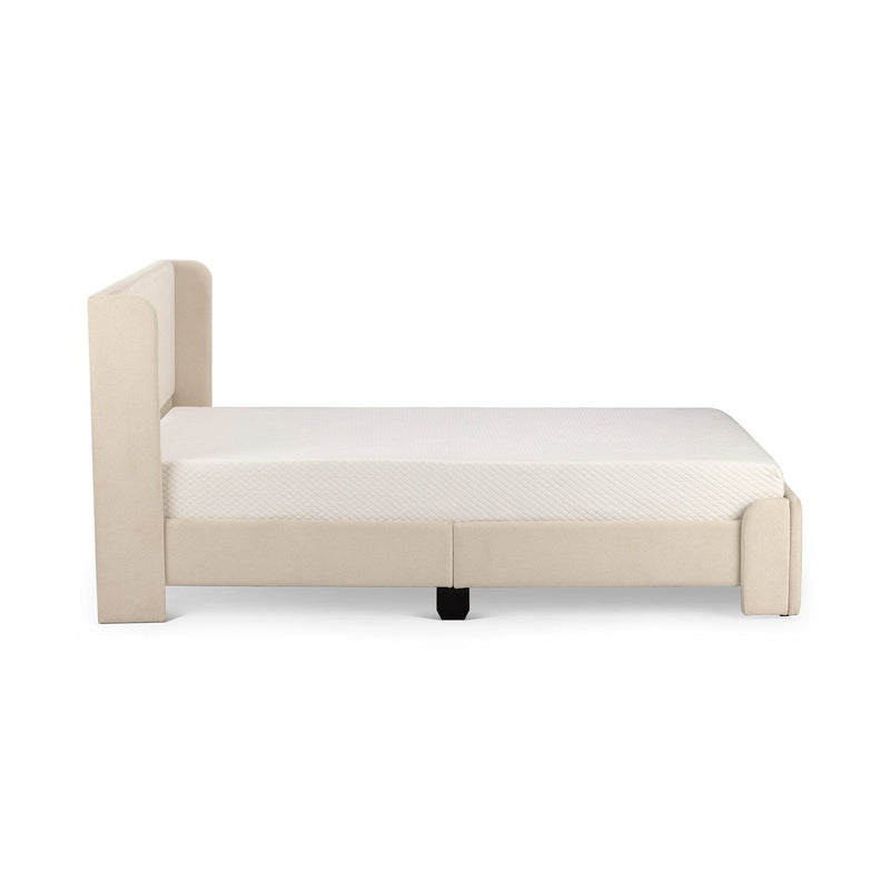 Beige upholstered platform bed frame with tall padded headboard and white mattress, modern minimalist bedroom furniture, side view