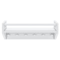 White wall-mounted shelf with five hooks and rail, ideal for organizing home spaces.