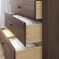 Dark walnut bedroom dresser with open drawers showing folded linens, light plywood dovetail drawer boxes and metal slides — modern rustic bedroom storage furniture