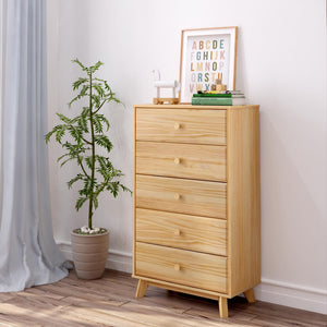 Light pine five-drawer dresser chest in bright modern bedroom with potted plant, framed alphabet print and hardwood floor