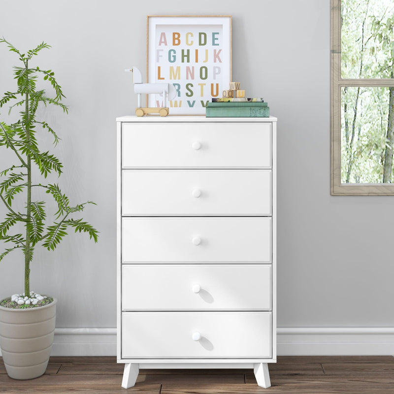Modern white five-drawer dresser in minimalist nursery with colorful alphabet wall art, wooden toy horse, stacked books, potted plant and hardwood floor