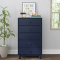 Navy blue five-drawer tall dresser in a modern nursery with framed colorful ABC print, wooden toy horse, stacked books, potted plant and window