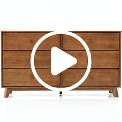 Modern wooden dresser with multiple drawers in a stylish design.