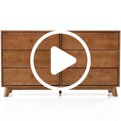 Mid-century modern wooden dresser with six drawers, featuring a minimalistic design and smooth finish.