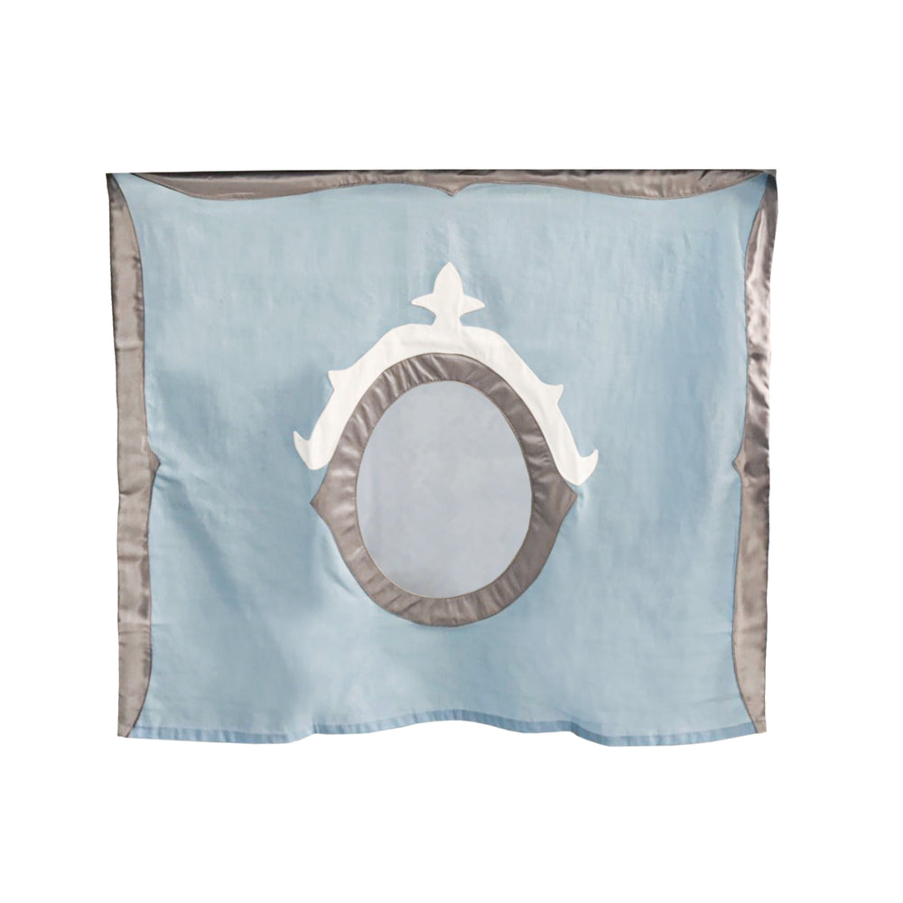 Luxury blue silk scarf with intricate oval design featuring silver and white accents.