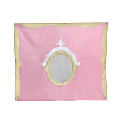 Pink and gold fabric frame with oval mirror, elegant decorative home accessory.