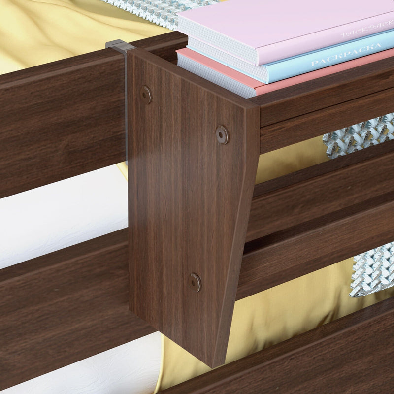 Dark walnut wooden bunk bed guardrail close-up with pastel books, yellow bedding and white mattress — sturdy slatted frame and visible metal fasteners