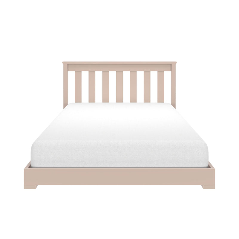 Beige wooden slatted headboard and platform bed with white mattress, minimalist twin bedroom furniture