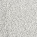 Close-up of white carpet texture with soft looped fibers — plush rug flooring background for home interior design