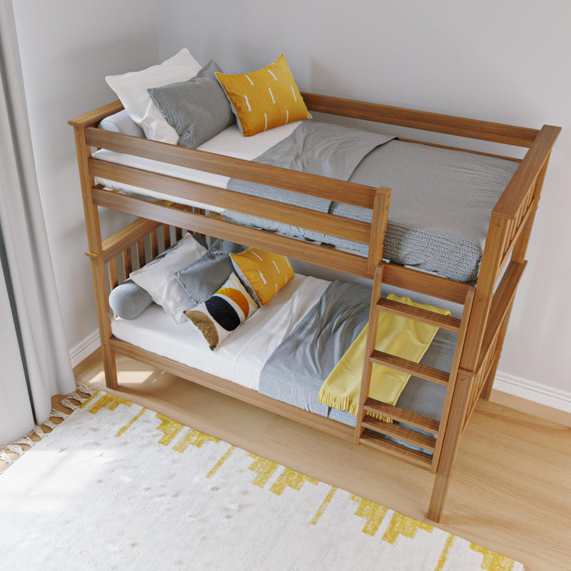 Wooden bunk bed with grey and yellow bedding in a bright kids' room, featuring a modern design and cozy textiles.