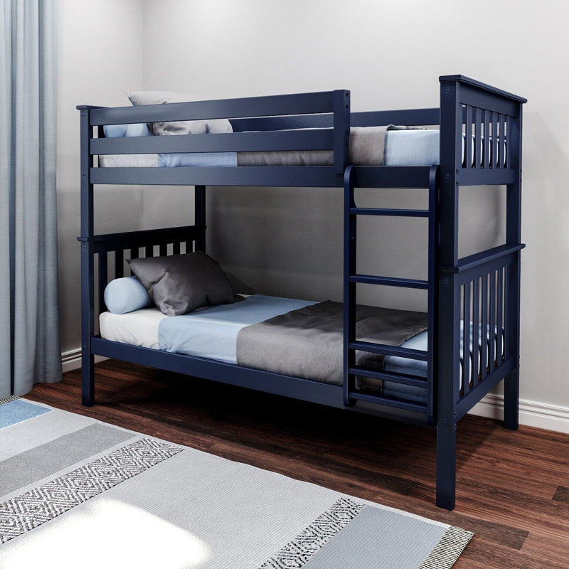 Modern navy blue wooden twin-over-twin bunk bed with ladder, gray and blue bedding in a children's bedroom on hardwood floors with light blue curtains and area rug — space-saving bunk bed for small rooms