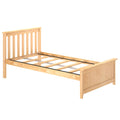 Light natural pine wood platform bed frame with slatted headboard, wooden slat mattress support and minimalist bedroom design