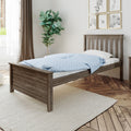 Rustic gray wood twin bed frame with slatted headboard and blue polka-dot duvet in bright modern farmhouse bedroom with fiddle leaf fig, hardwood floors and neutral rug