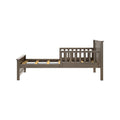 Gray-brown wooden toddler bed frame with slatted headboard, detachable safety guardrail, and visible mattress slats