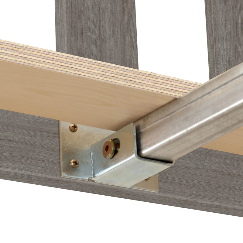 Garage door roller bracket close-up showing metal track, mounting plate and screws secured to plywood header — heavy-duty garage door hardware installation detail