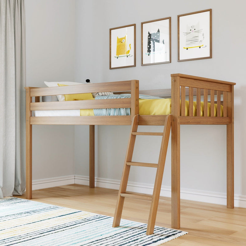 Light wood loft bed with ladder and yellow bedding in a modern kids' bedroom featuring cat wall art and striped rug