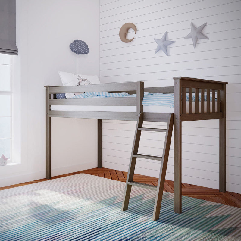 Gray loft bed with ladder in modern children's room with striped rug and wall decor.
