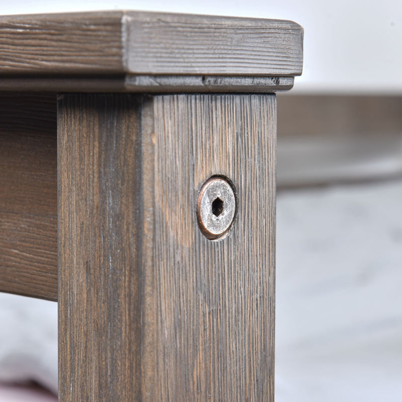 Close-up of a rustic wooden furniture joint with visible screw, ideal for home decor and interior design inspiration.