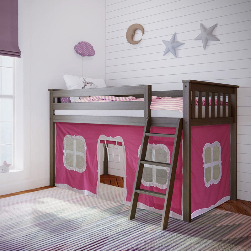Gray wooden loft bed with ladder and pink playhouse tent panels underneath in kids' bedroom, striped rug and star-and-moon wall decor