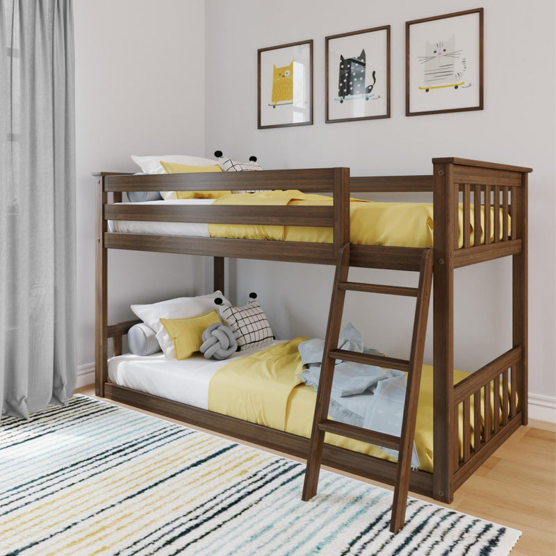 Modern wooden bunk bed in children's bedroom with yellow bedding, ladder, decorative pillows, striped rug and framed cat wall art