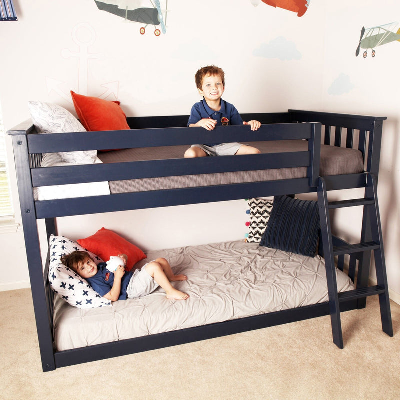 Children enjoying a navy blue bunk bed in a playful bedroom, perfect for shared kids' rooms.